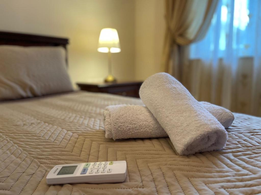 Postel nebo postele na pokoji v ubytování Likas House