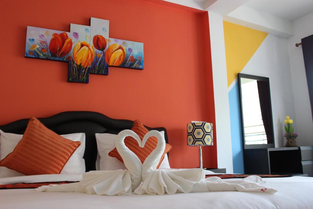 Postel nebo postele na pokoji v ubytování Tulip Inn
