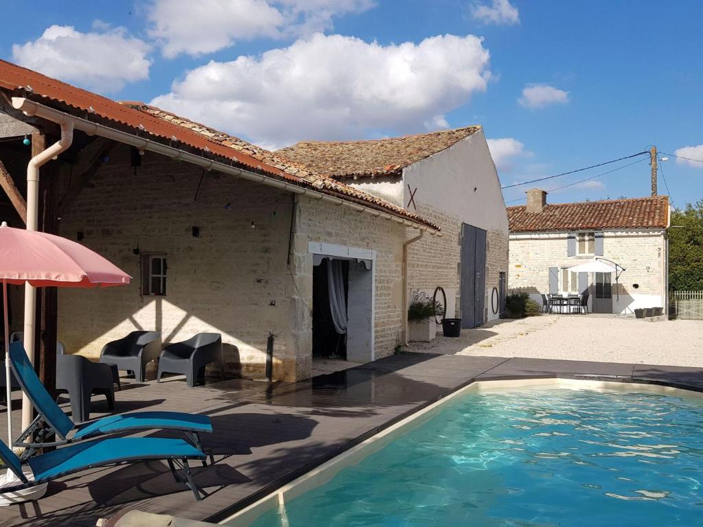 The swimming pool at or close to Appealing holiday home in Loubigné with private pool