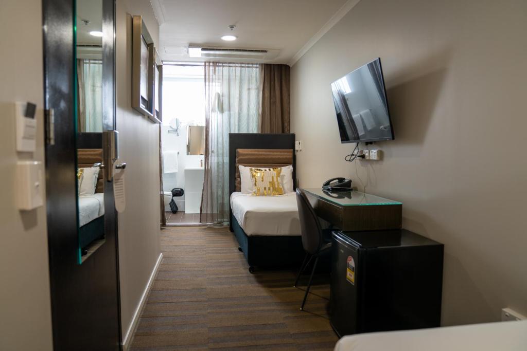 Postel nebo postele na pokoji v ubytování 57Hotel
