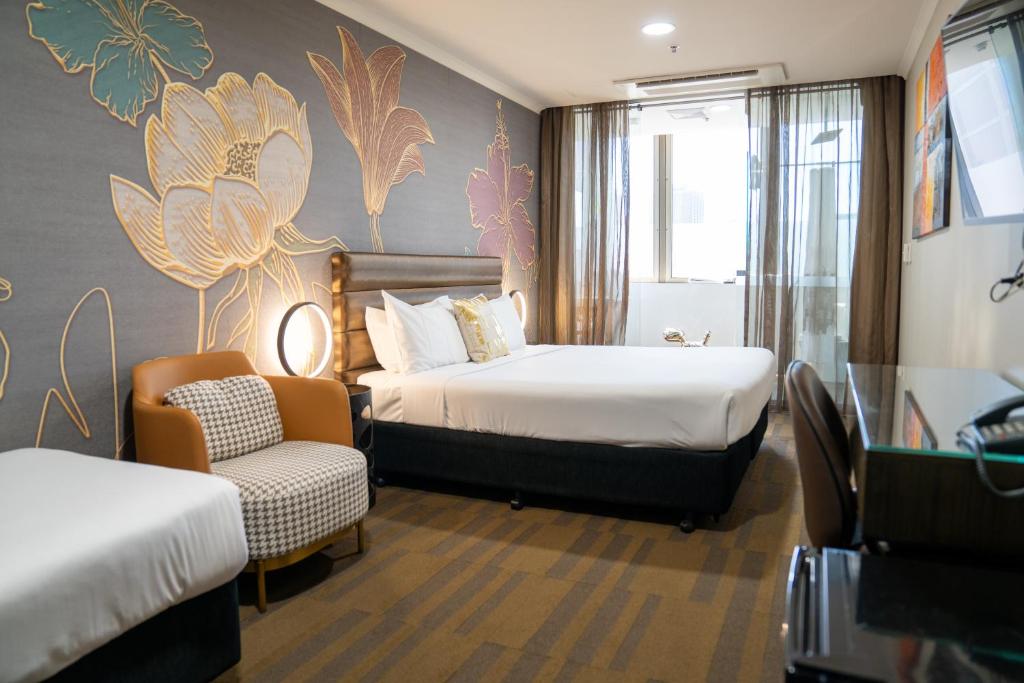 Postel nebo postele na pokoji v ubytování 57Hotel