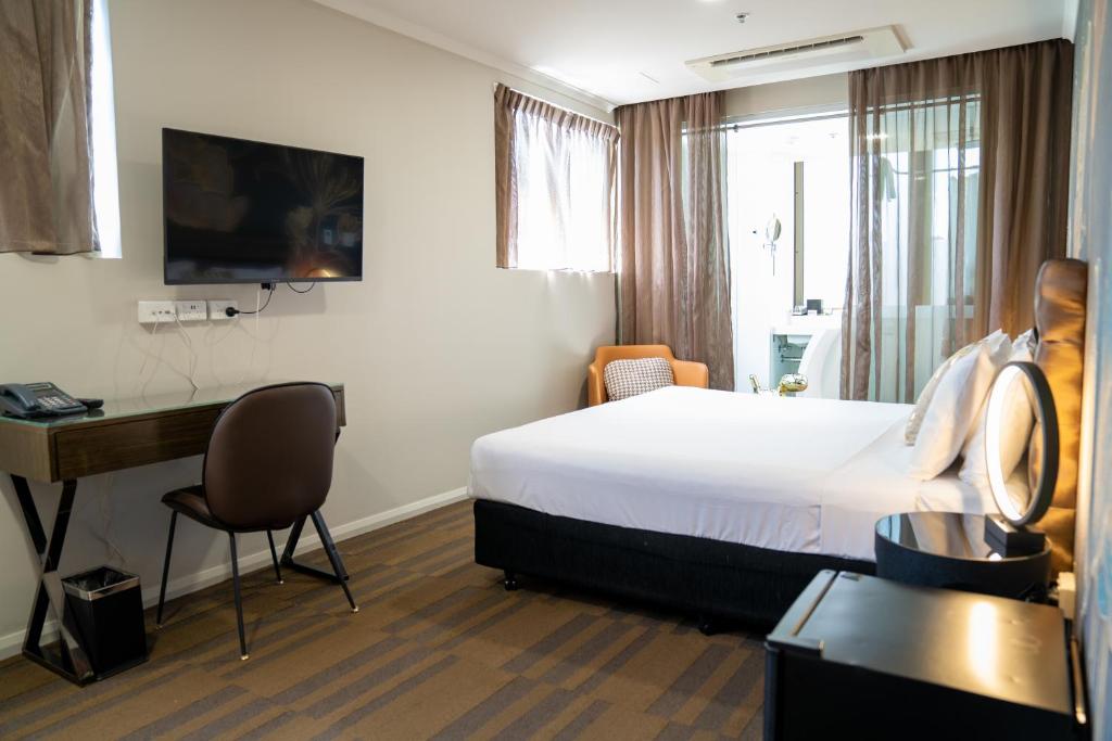 TV a/nebo společenská místnost v ubytování 57Hotel