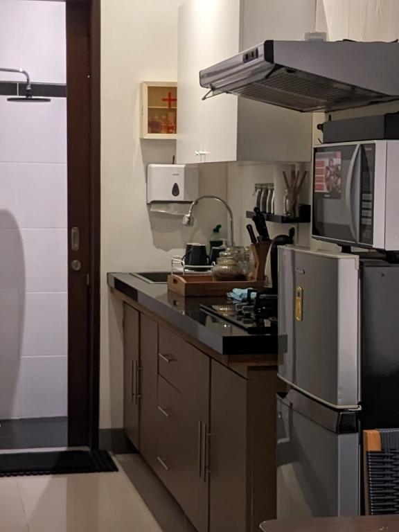 Kuchyň nebo kuchyňský kout v ubytování Dim House Jimbaran
