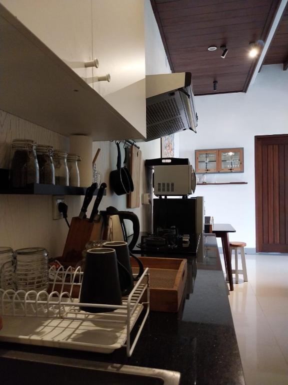 Kuchyň nebo kuchyňský kout v ubytování Dim House Jimbaran
