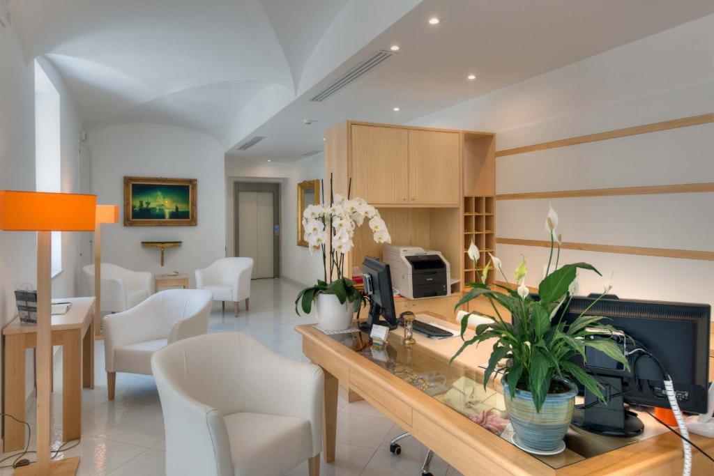 Kuchyň nebo kuchyňský kout v ubytování Boutique Hotel Helios
