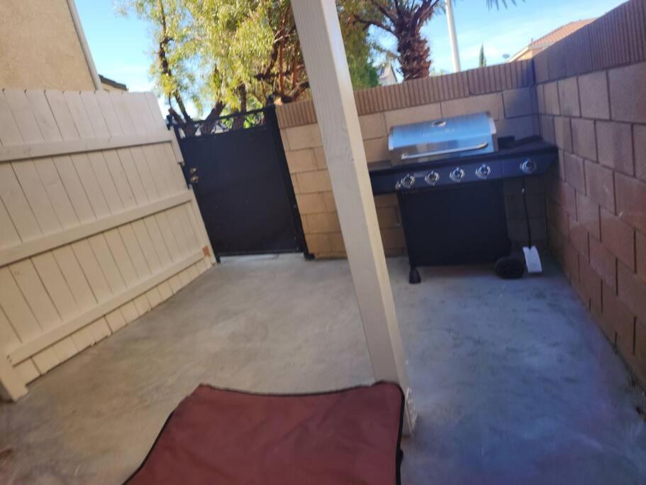 an outdoor kitchen with a stove top oven in a backyard at Luxurious All Private GuestSuite in Lancaster