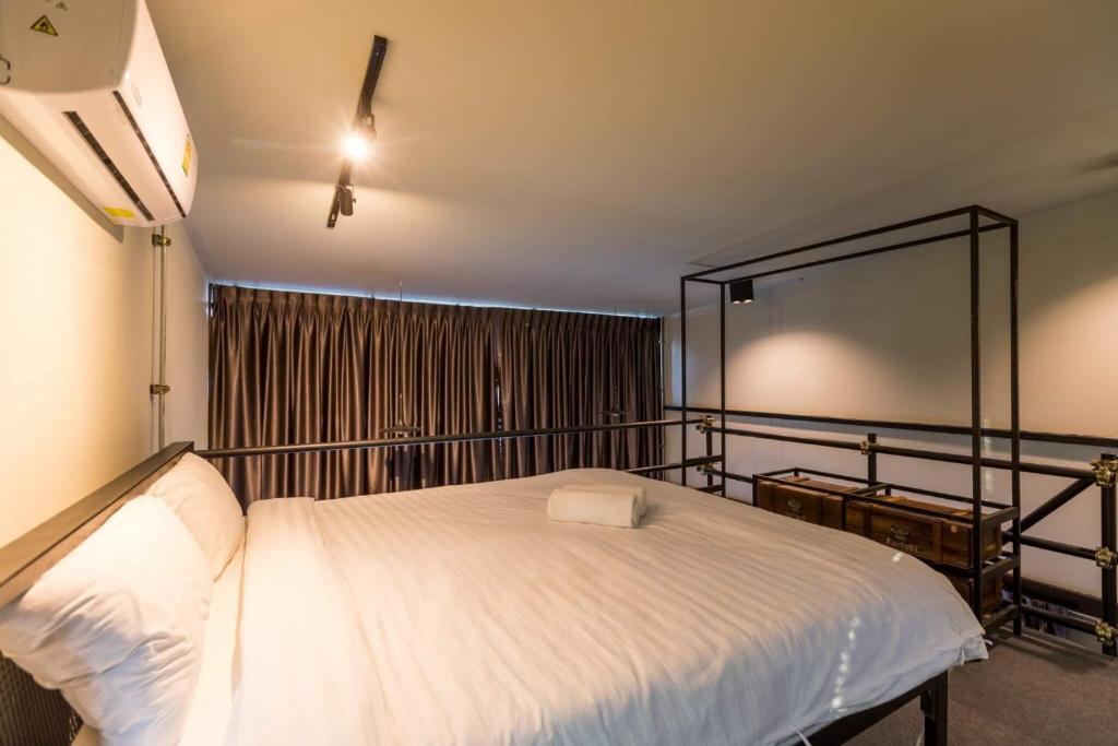 Postel nebo postele na pokoji v ubytování 9BR Neverland Loft Pool Villa