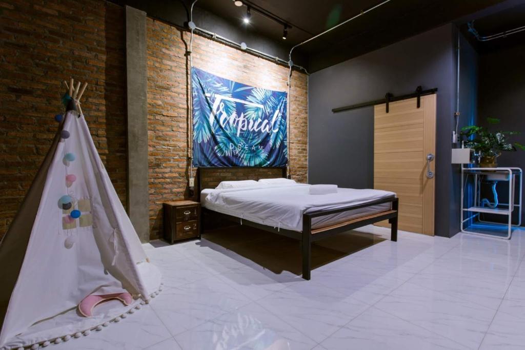 Postel nebo postele na pokoji v ubytování 9BR Neverland Loft Pool Villa