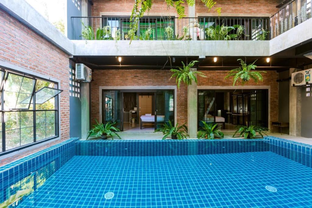 Bazén v ubytování 9BR Neverland Loft Pool Villa nebo v jeho okolí