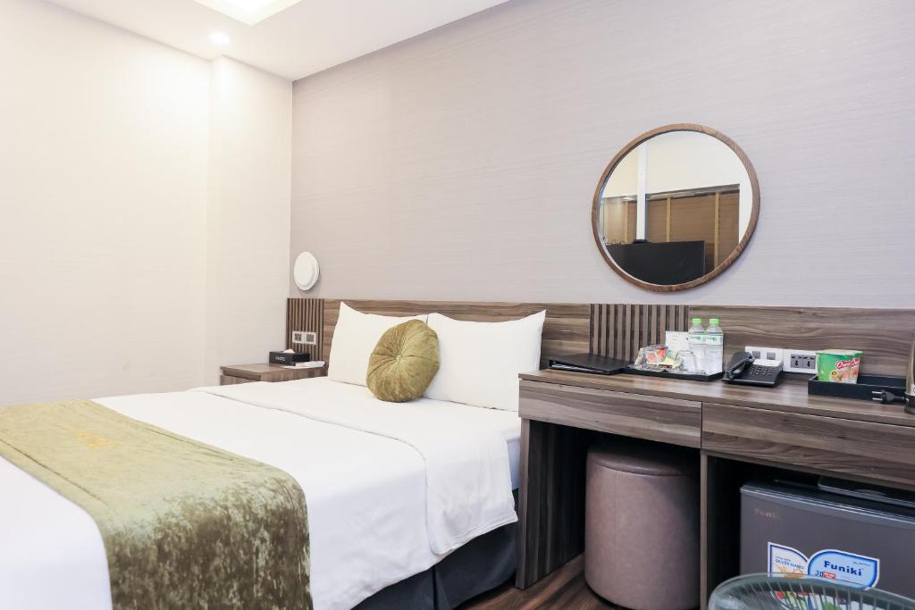 Postel nebo postele na pokoji v ubytování 3T Hotel Hanoi