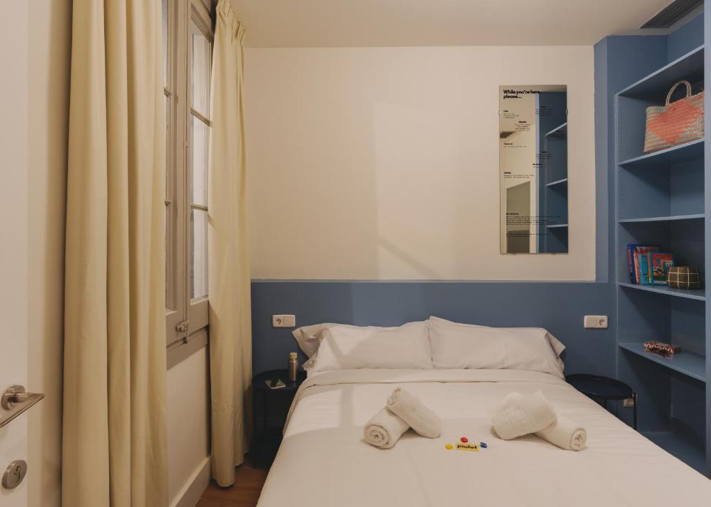Postel nebo postele na pokoji v ubytování Piulet Hostel