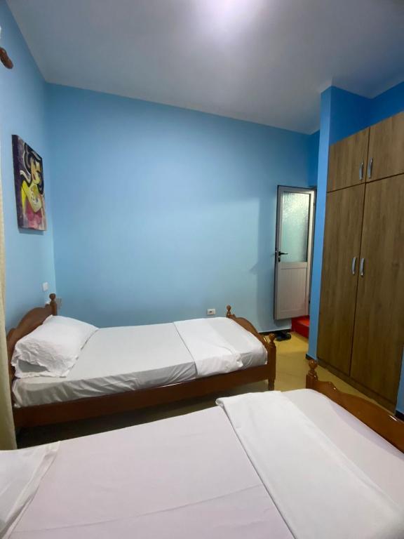 Postel nebo postele na pokoji v ubytování RIVER ROOMS