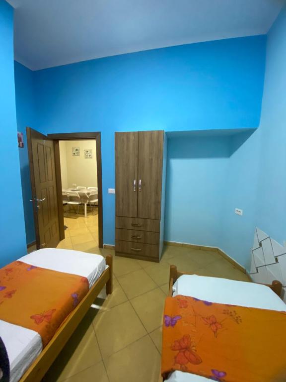 Postel nebo postele na pokoji v ubytování RIVER ROOMS