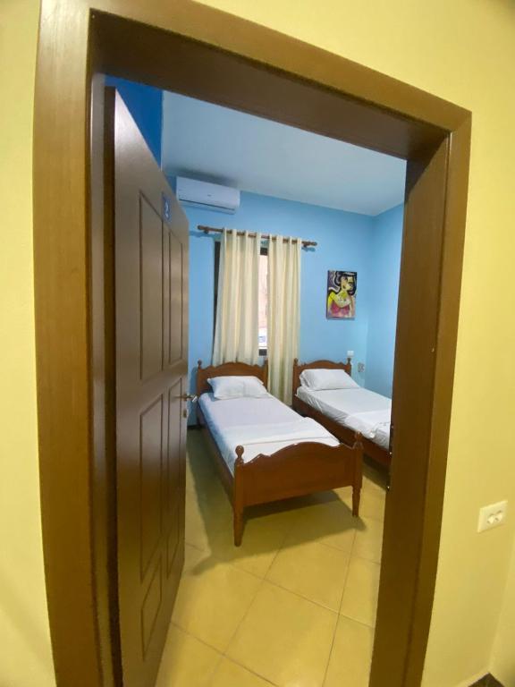 Postel nebo postele na pokoji v ubytování RIVER ROOMS