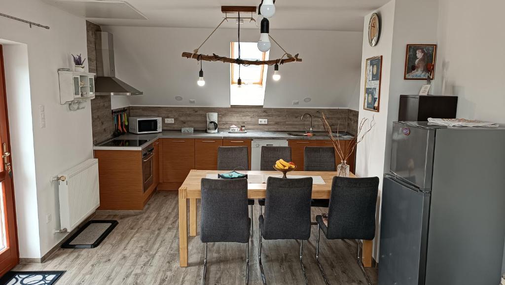 Kuchyň nebo kuchyňský kout v ubytování Marianna Apartman