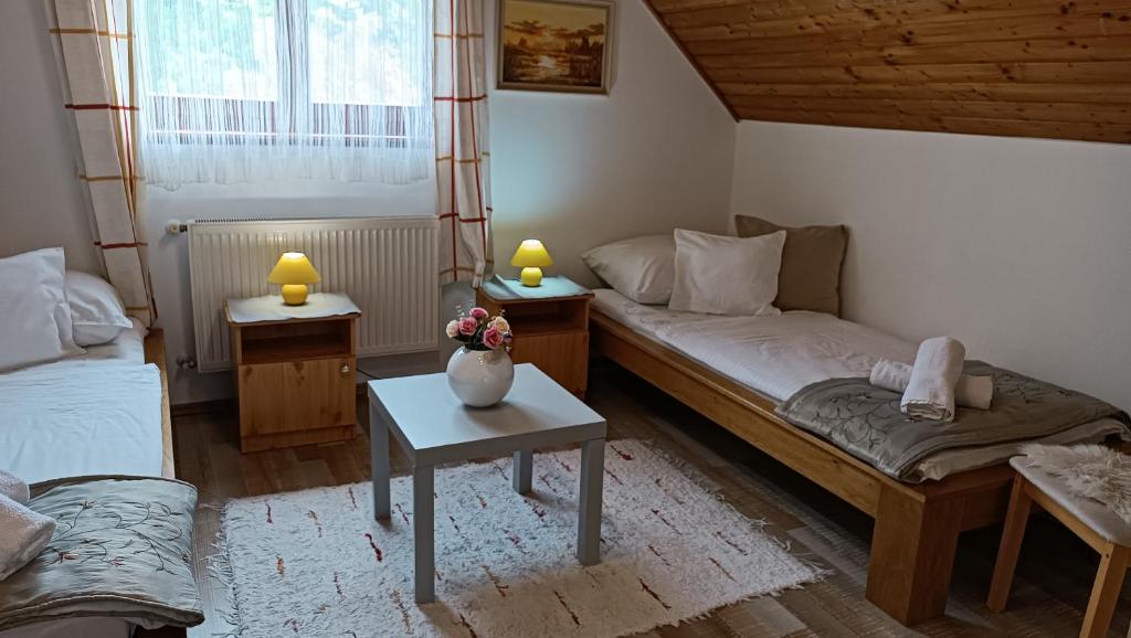 Postel nebo postele na pokoji v ubytování Marianna Apartman