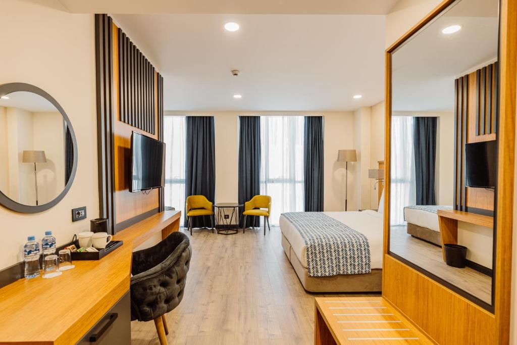 Ένα ή περισσότερα κρεβάτια σε δωμάτιο στο Best Western Plus Batumi