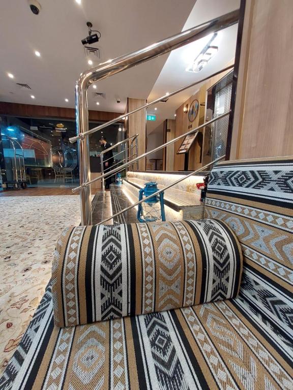 a room with two beds in a store at AG Hotel in Abu Dhabi
