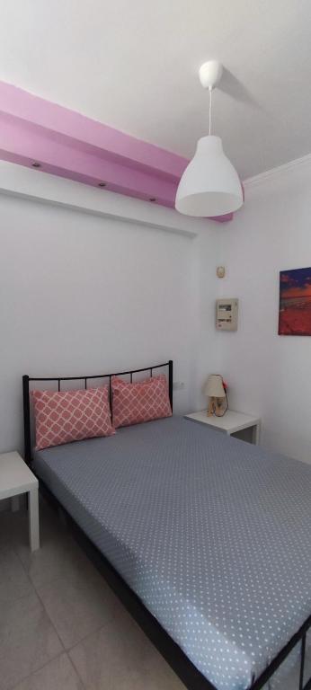 Postel nebo postele na pokoji v ubytování Top Holidays Apartments