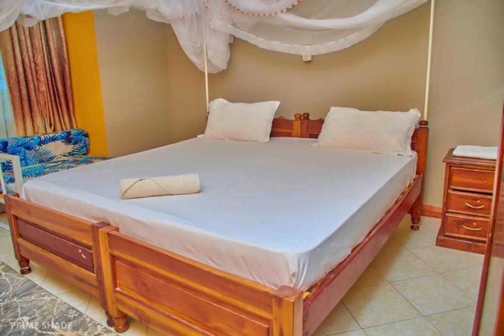 Postel nebo postele na pokoji v ubytování PRIMESHADE GUESTHOUSE