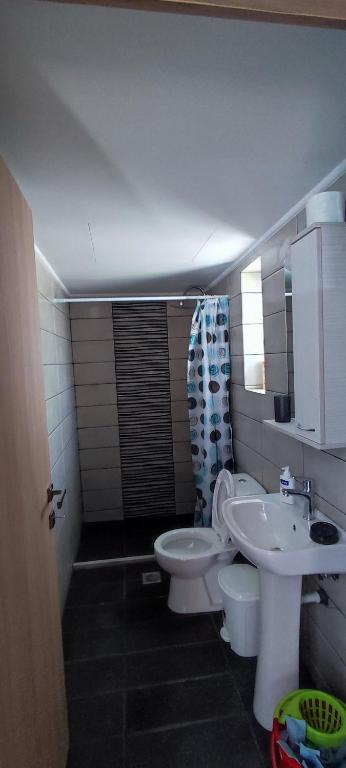 Koupelna v ubytování Top Holidays Apartments