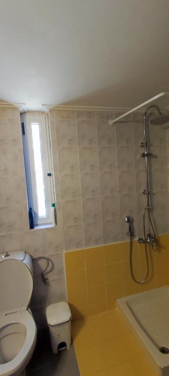 Koupelna v ubytování Top Holidays Apartments