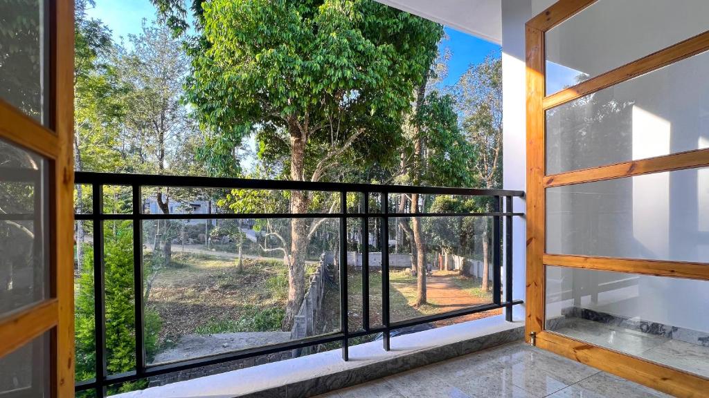 Balkón nebo terasa v ubytování MERIDIAN HILL TOP YERCAUD