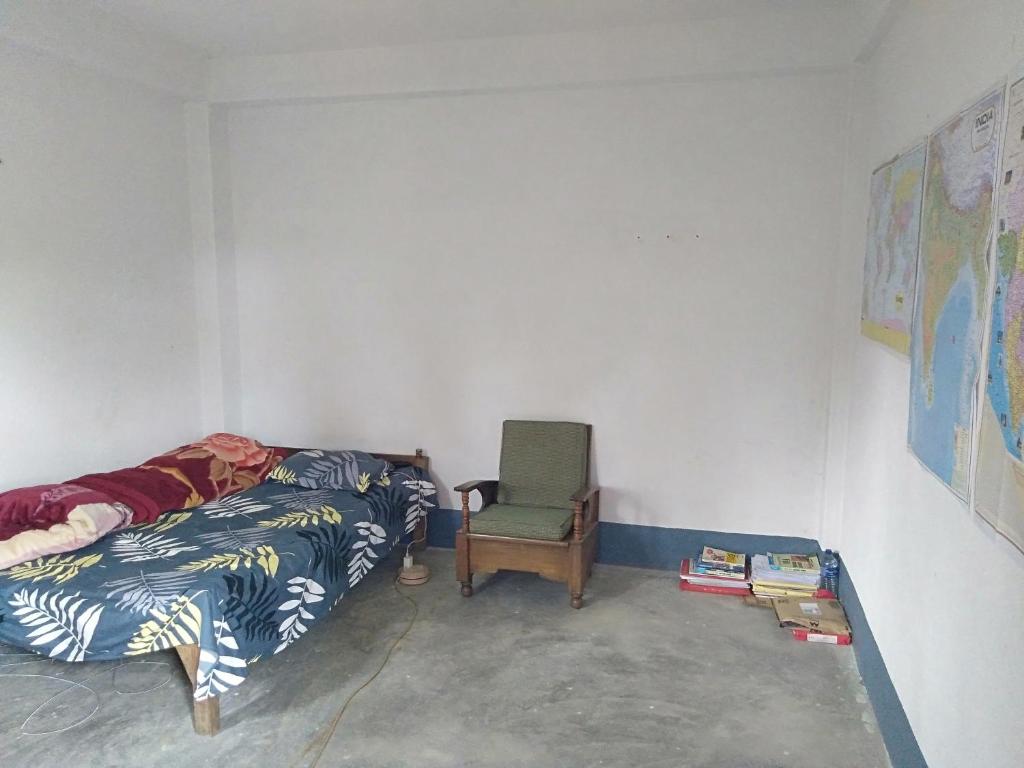 Ένα ή περισσότερα κρεβάτια σε δωμάτιο στο Vilho Homestay