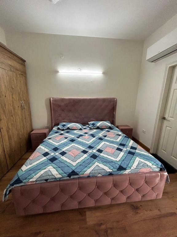 Voodi või voodid majutusasutuse Modern Apartment toas