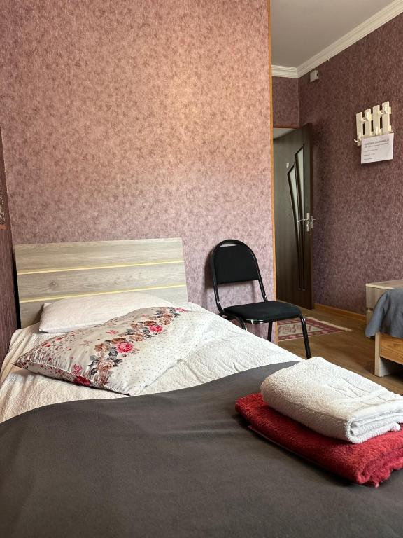 Postel nebo postele na pokoji v ubytování Guest house chavchavadze N23