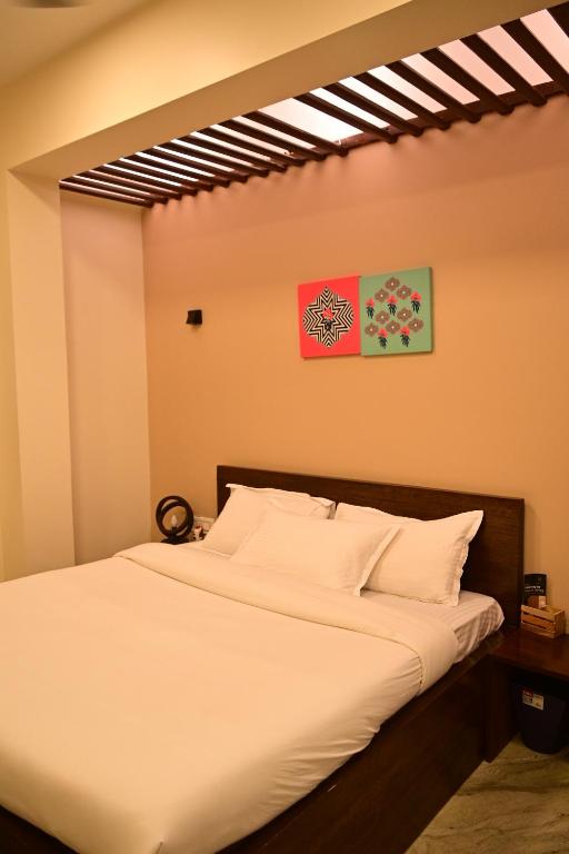 Postel nebo postele na pokoji v ubytování The Broome Kolkata