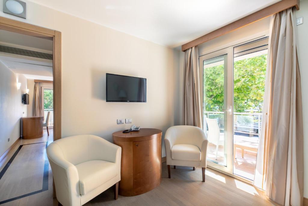 TV a/nebo společenská místnost v ubytování Hotel Villa Doimo