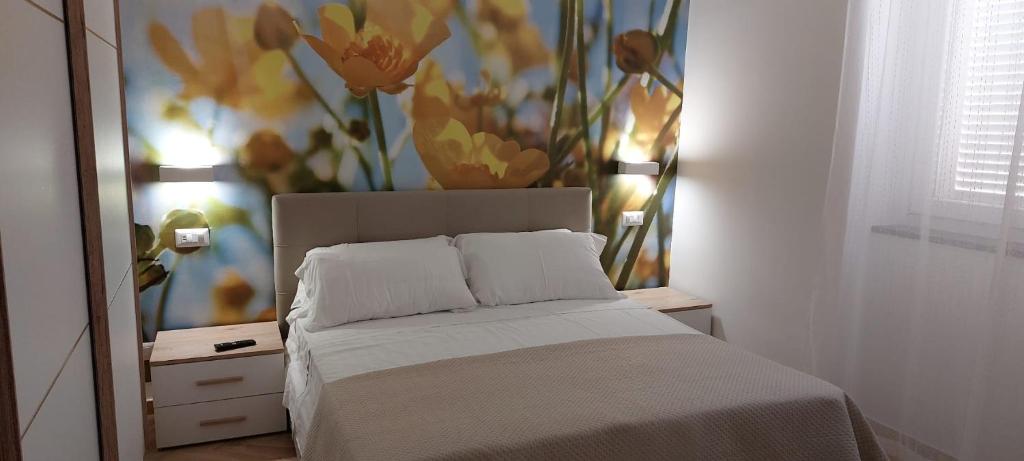 Postel nebo postele na pokoji v ubytování Camelia Vico Equense