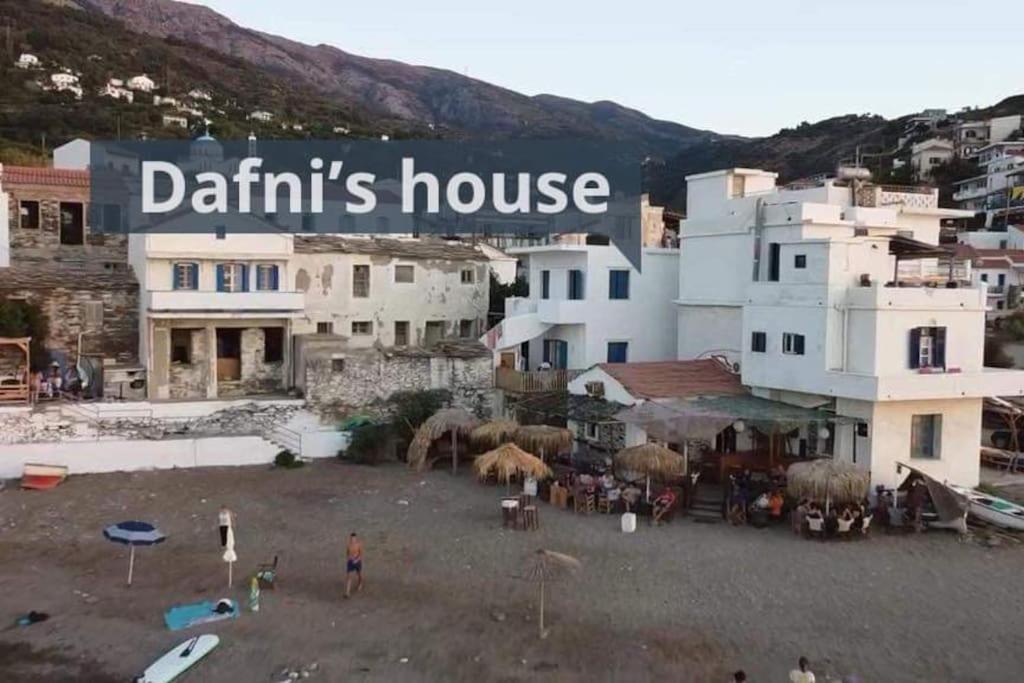 a group of buildings with a sign that reads dartiths house at Dafnis beach house in Karavostamo