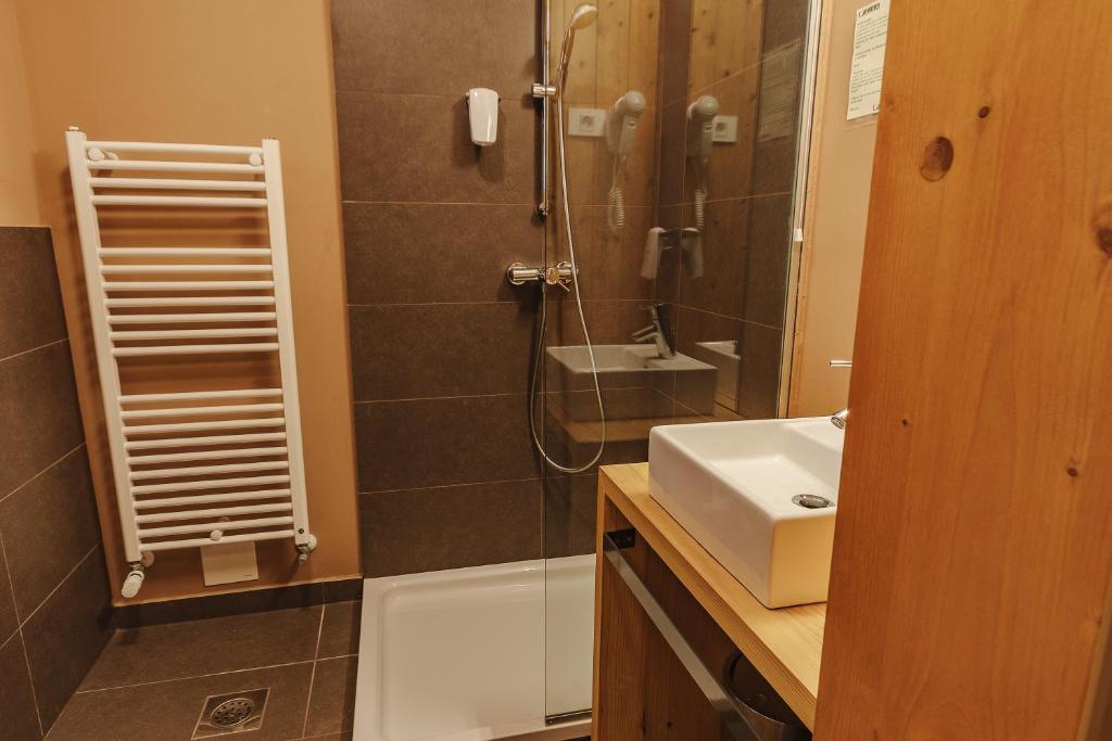 Koupelna v ubytování Hotel Jelka Pokljuka