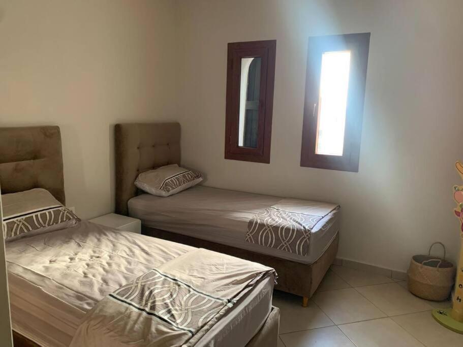 Postel nebo postele na pokoji v ubytování Superbe appartement neuf en résidence avec piscine