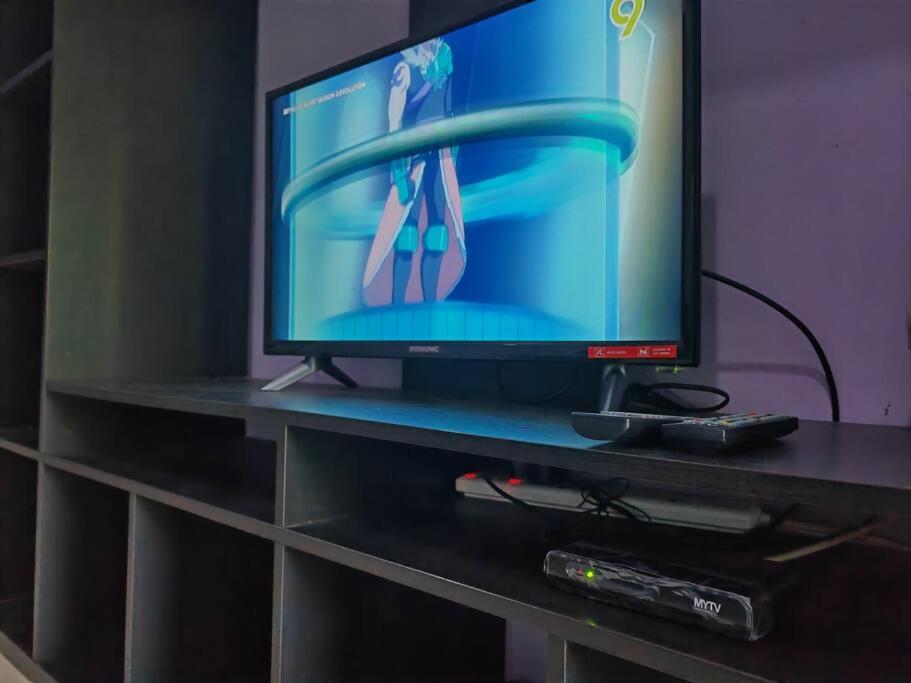 TV a/nebo společenská místnost v ubytování Mawar Homestay Netflix Cuckoo