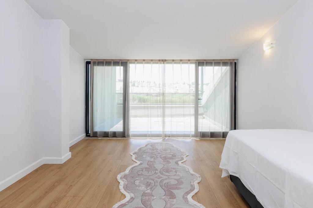 Postel nebo postele na pokoji v ubytování Port Lara Villas