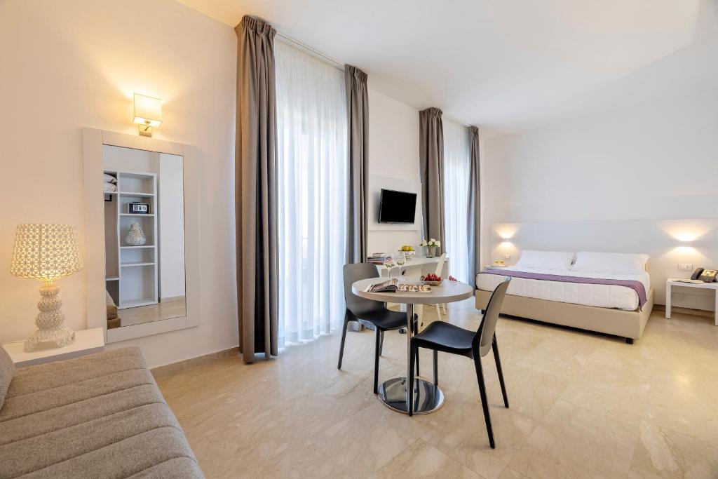 Postel nebo postele na pokoji v ubytování Hotel Venere di Erice Resort & Spa