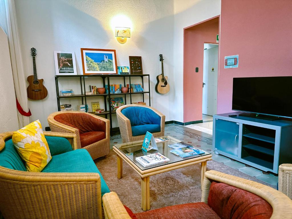 TV o dispositivi per l'intrattenimento presso Hotel Bello by Ostello Bello