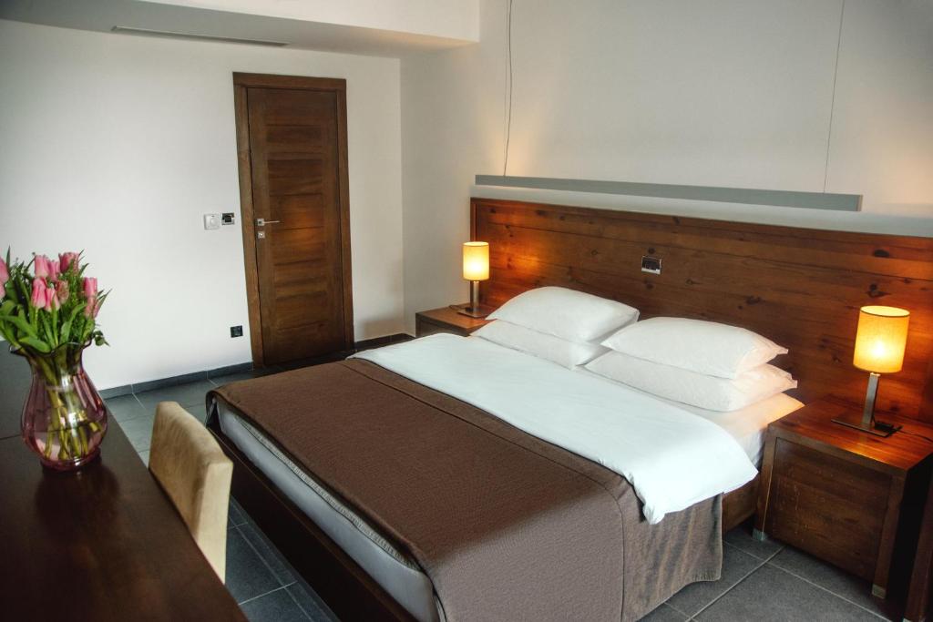 Postel nebo postele na pokoji v ubytování Avala Resort & Villas