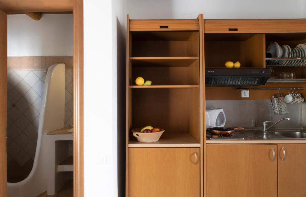 Kuchyň nebo kuchyňský kout v ubytování Panteli Beach Hotel