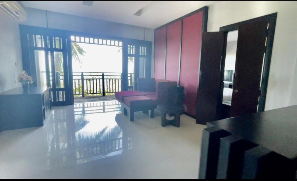 Posezení v ubytování Bhundhari Residence Koh Samui