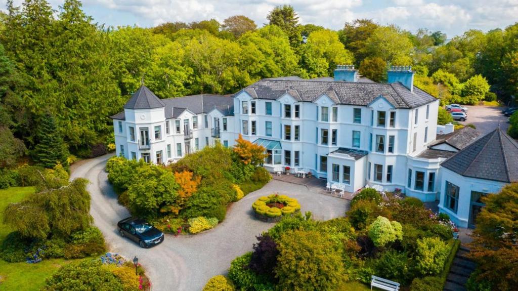 an aerial view of a large house with a yard at Seaview House Hotel in Bantry