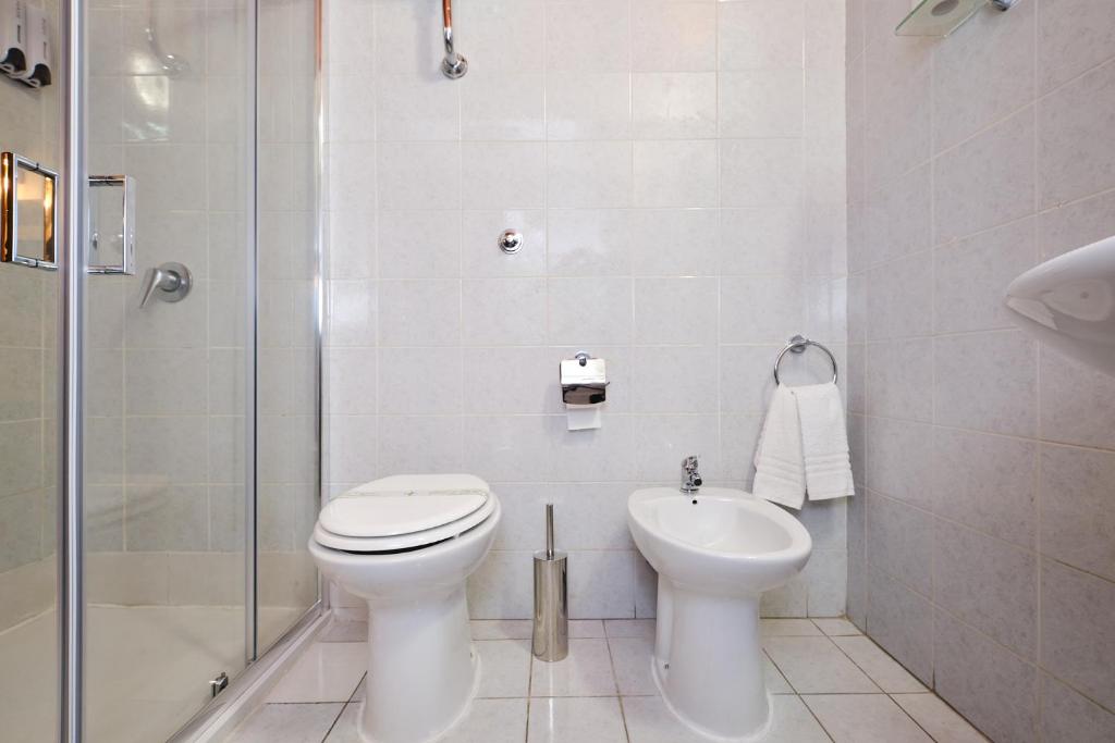 Koupelna v ubytování Albergo Della Posta