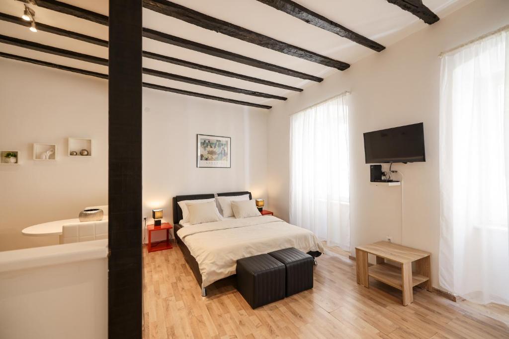 Posteľ alebo postele v izbe v ubytovaní Studio Kalelarga