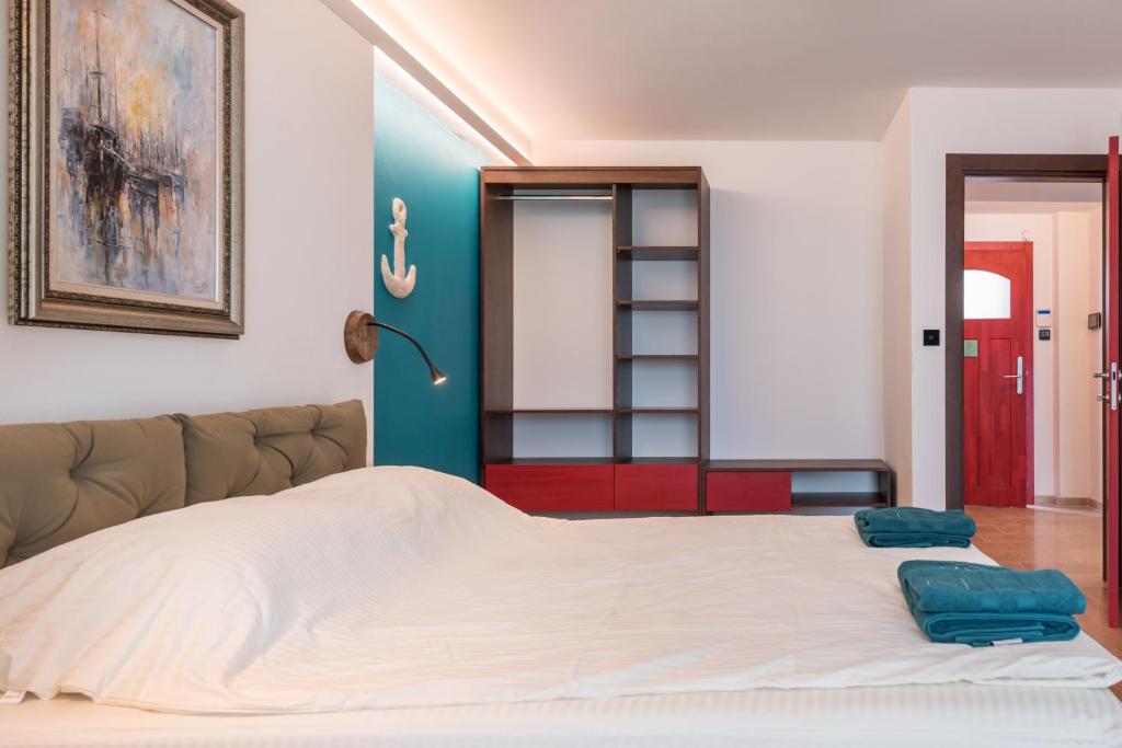 Postel nebo postele na pokoji v ubytování Balkida Residence - Balchik Villas
