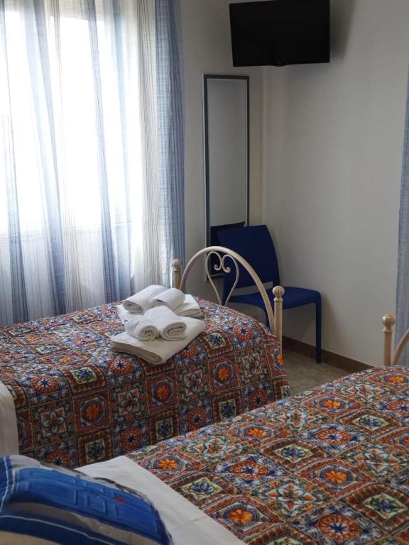 Postel nebo postele na pokoji v ubytování A Due Passi Dal Molino