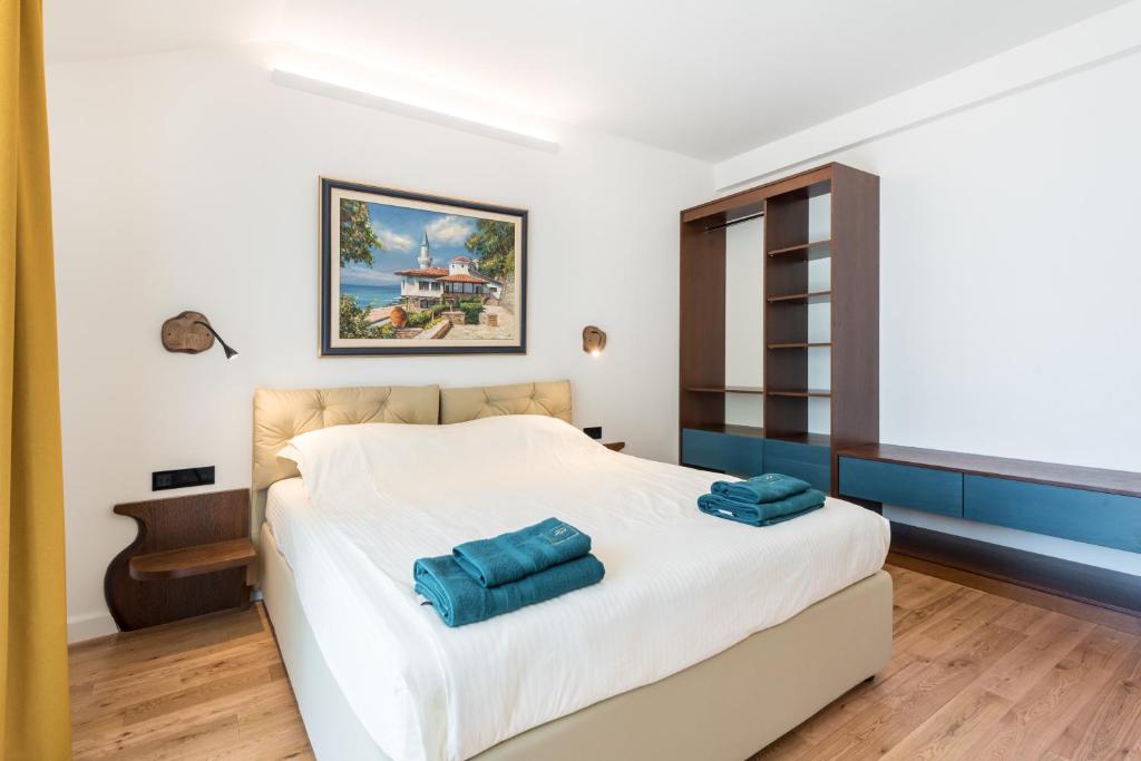 Postel nebo postele na pokoji v ubytování Balkida Residence - Balchik Villas