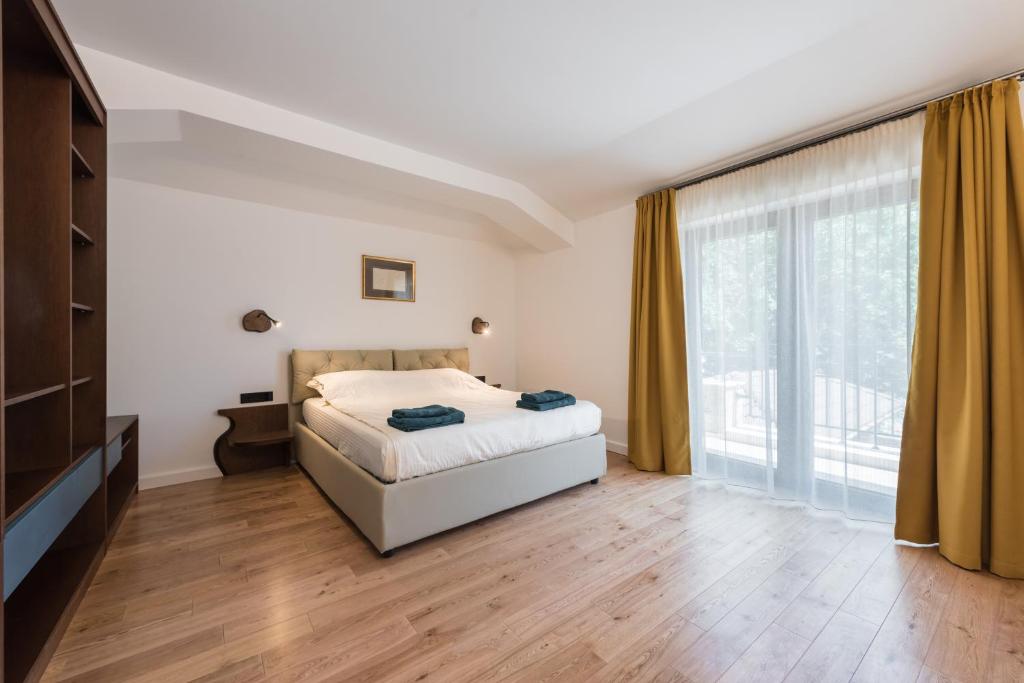 Postel nebo postele na pokoji v ubytování Balkida Residence - Balchik Villas